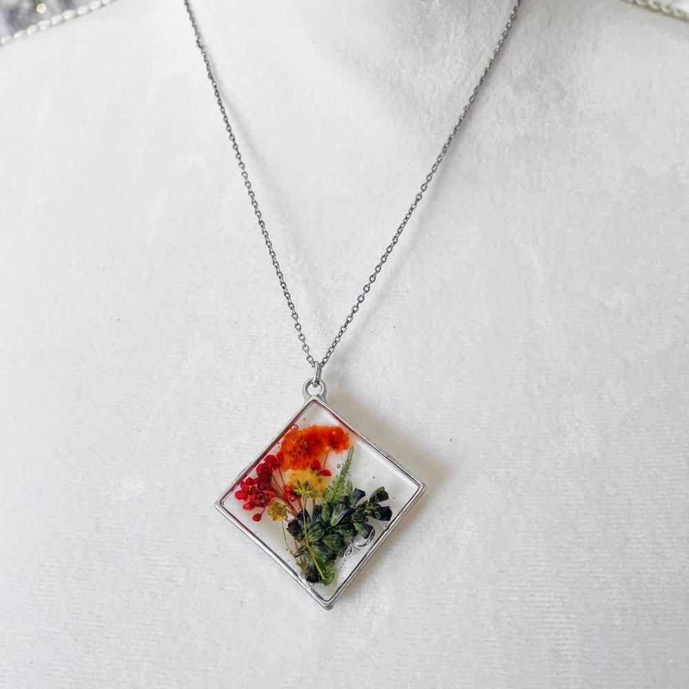 Diamond rainbow pride colorful floral botanical resin necklace with silver bezel